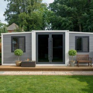 modular folding cabin home in garden setting